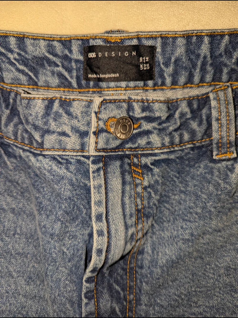 ASOS DESIGN denim relaxed shorts in midwash blue